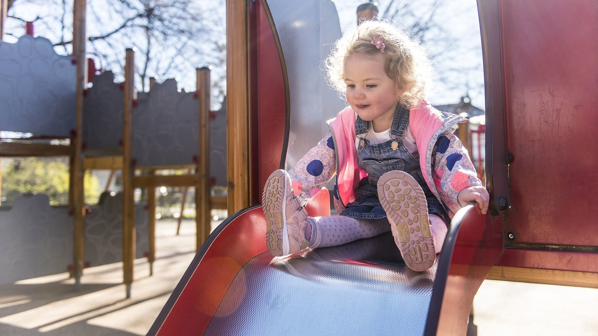 Little girl on slide with Lara_2-789682-edited